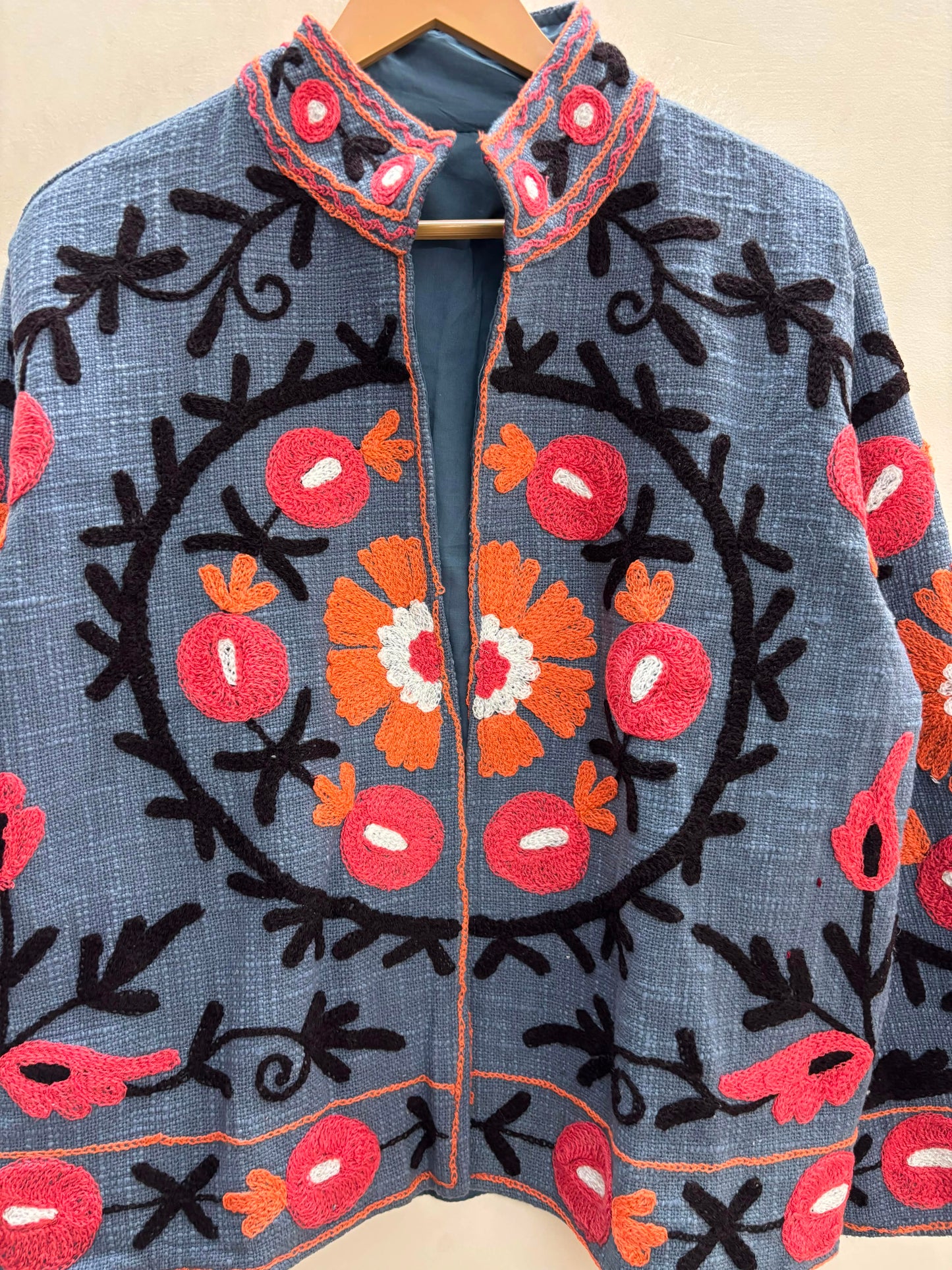 The Samarkand Bloom — Suzani Hand-Embroidered Cotton Jacket — Slate Blue with Coral & Marigold Florals