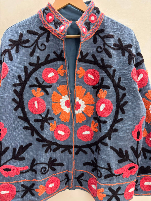 The Samarkand Bloom — Suzani Hand-Embroidered Cotton Jacket — Slate Blue with Coral & Marigold Florals