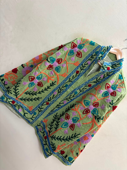The Sage Meadow — Suzani-Inspired Hand Embroidered Cotton Jacket — Pistachio Green with Coral, Lilac & Cerulean Florals
