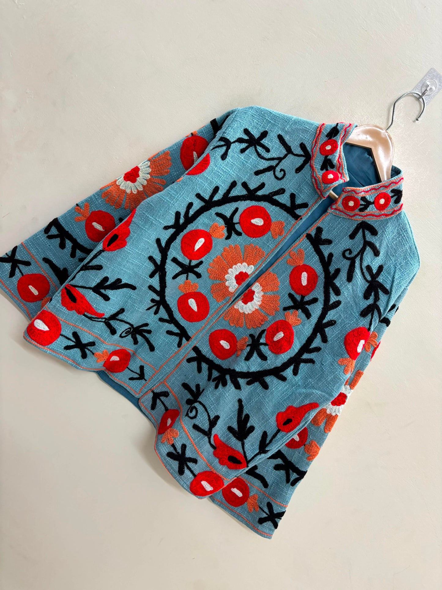 The Samarkand Bloom — Suzani Hand-Embroidered Cotton Jacket — Sky Blue with Crimson Pomegranates