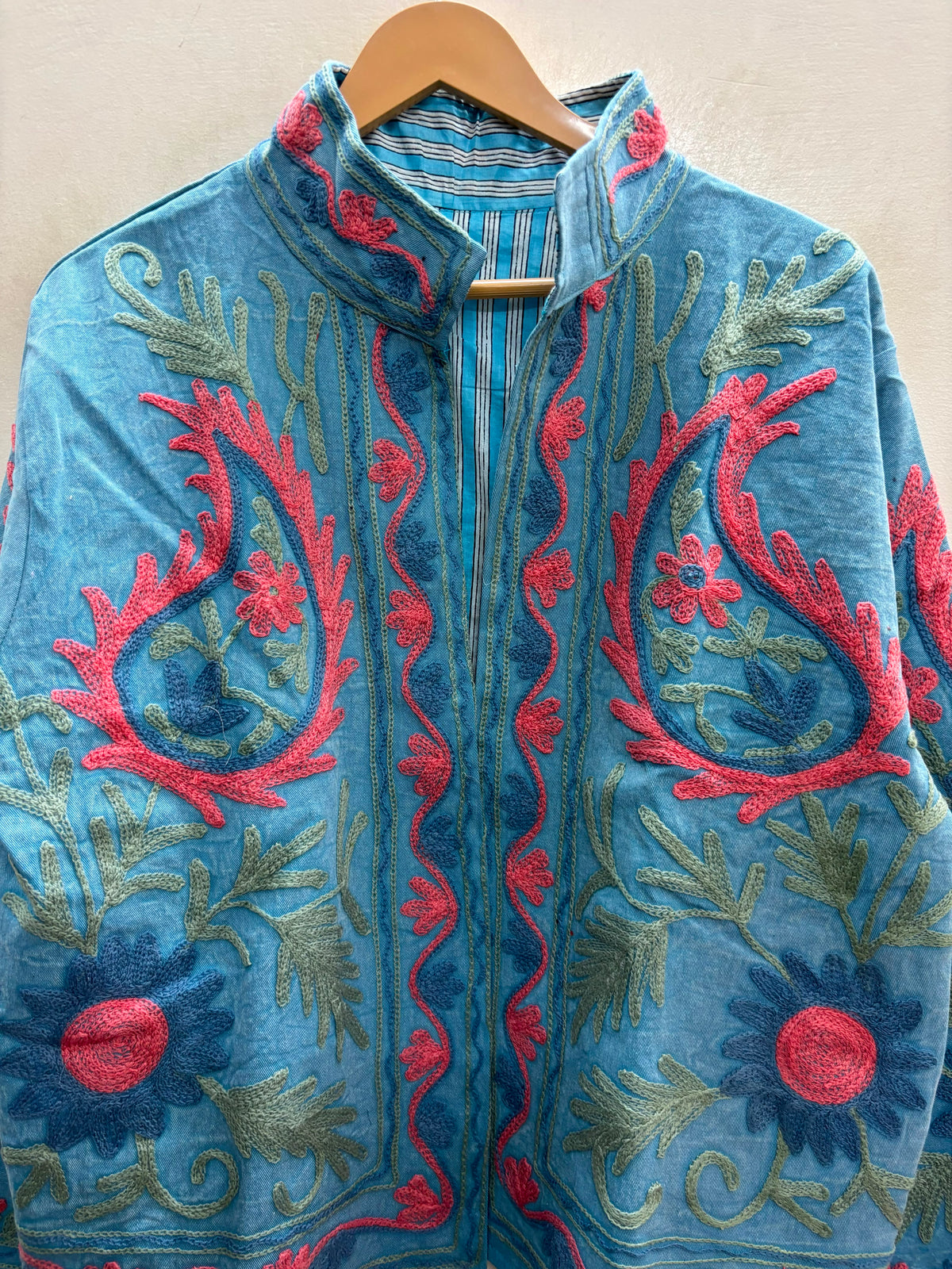 The Suzani Bloom — Suzani-Embroidered Cotton Jacket — Denim Blue with Coral & Sage Florals