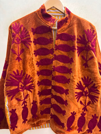 The Rangoli Koi — Suzani-Embroidered Velvet Jacket — Rust Orange with Maroon Fish & Bloom Motifs