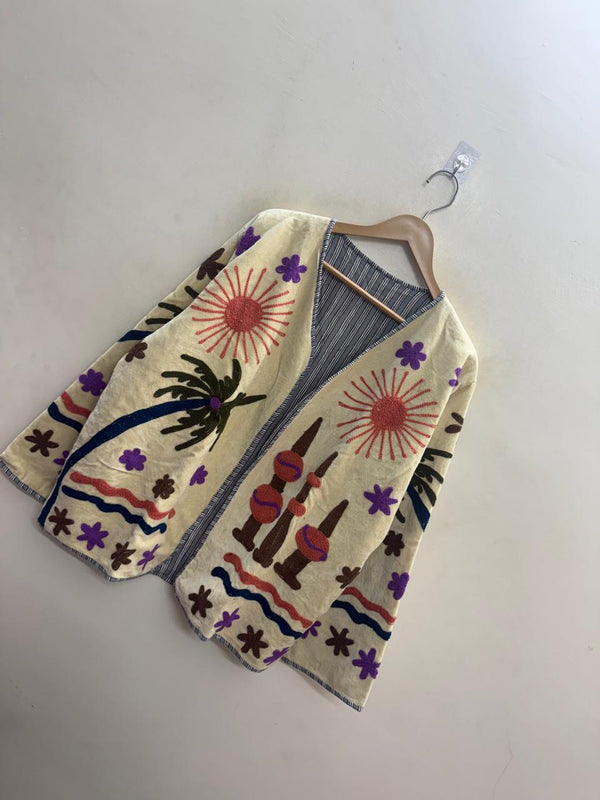 The Oasis Suzani — Hand-Embroidered Velvet Jacket — Ivory with Coral Sunbursts