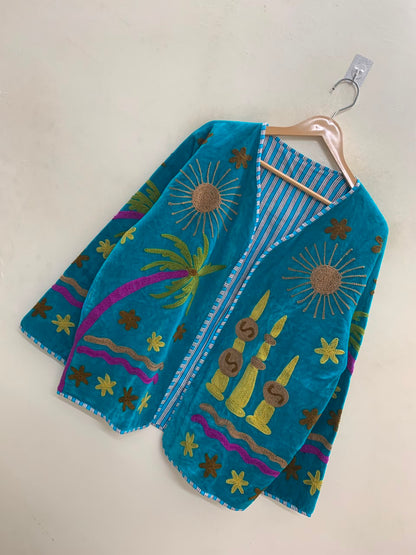The Desert Oasis — Suzani-Embroidered Velvet Jacket — Turquoise with Marigold Sun Motifs