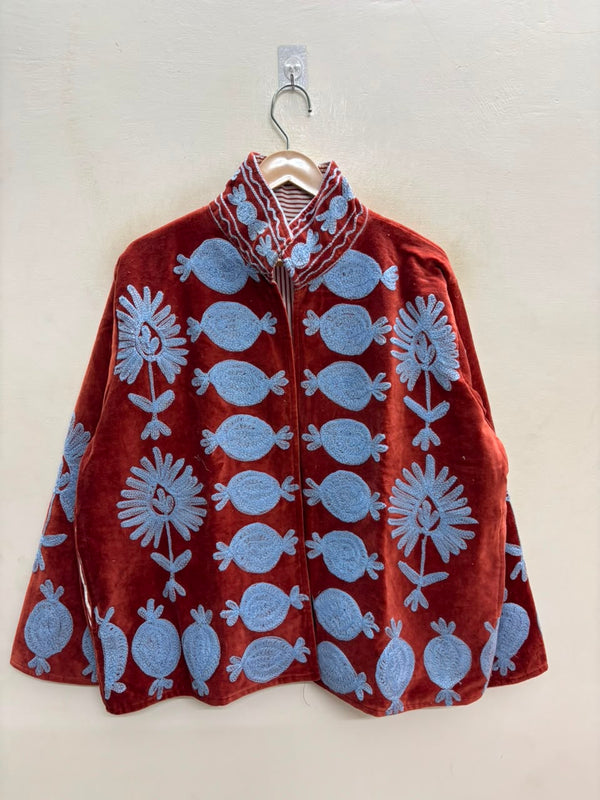 The Anar Bagh — Suzani Hand-Embroidered Velvet Cape Jacket — Rust Red with Powder Blue Motifs