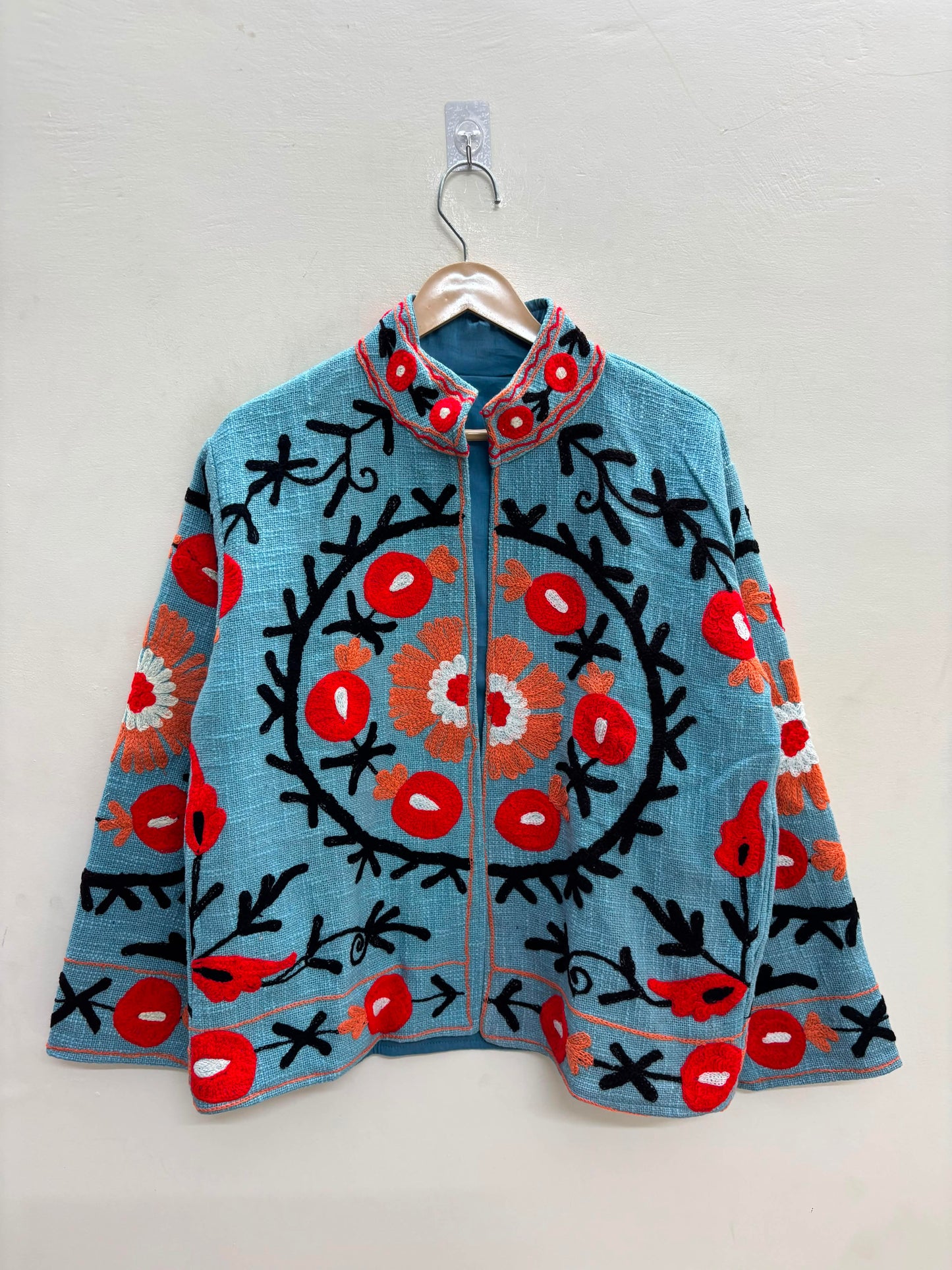 The Samarkand Bloom — Suzani Hand-Embroidered Cotton Jacket — Sky Blue with Crimson Pomegranates