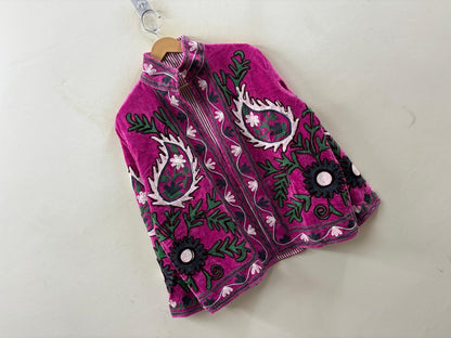 Purple embroidered bag with floral patterns on a white background