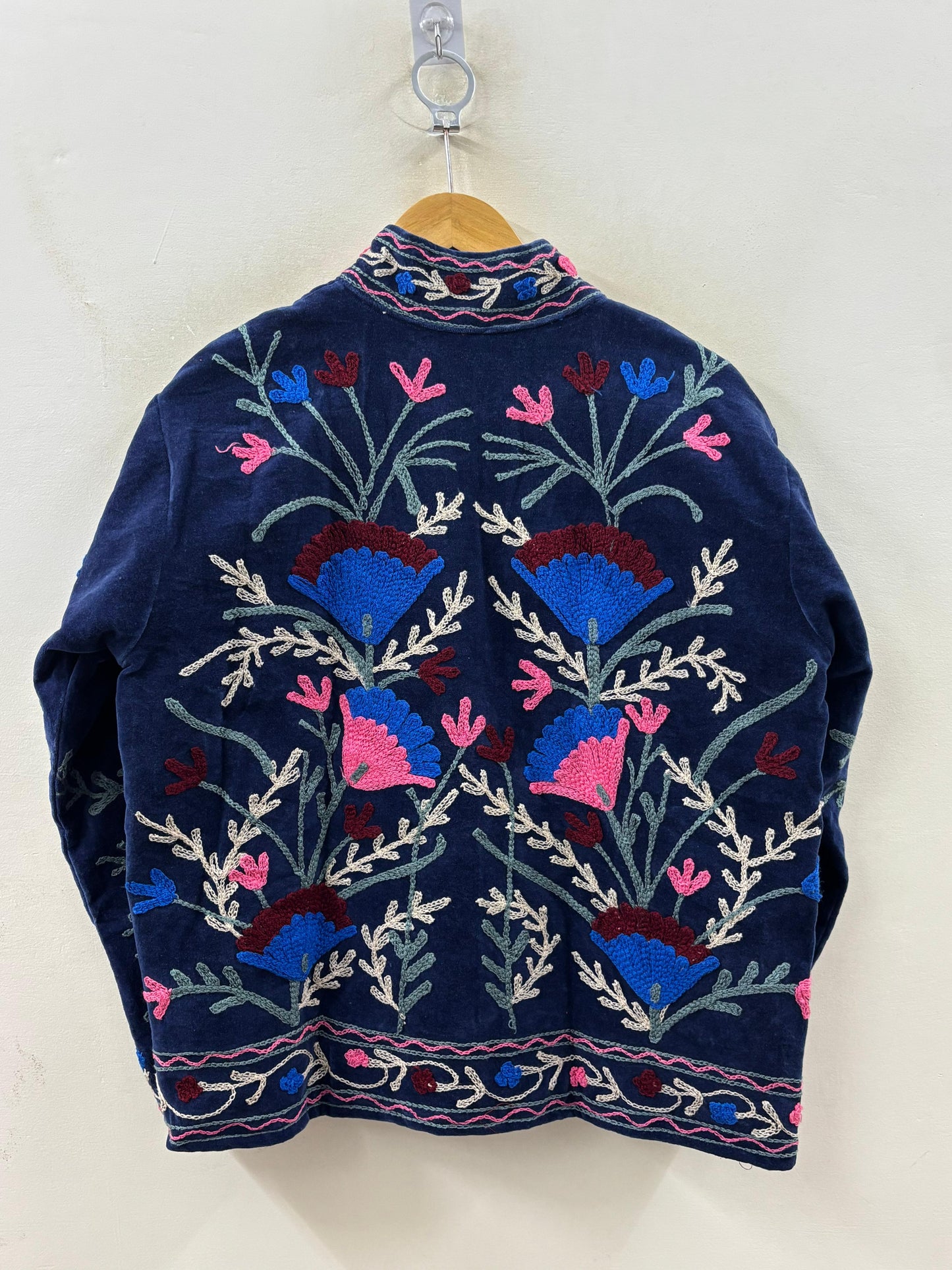Suzani hand-embroidered indigo velvet jacket with floral bloom motifs, artisan chain-stitch embroidery handcrafted in Jaipur | Zoshak