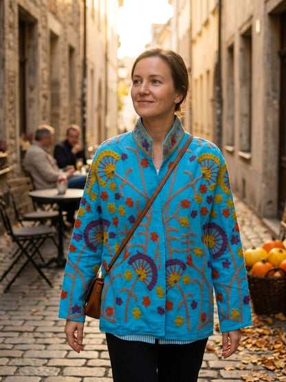 The Turquoise Oasis — Suzani Crewel-Embroidered Cotton Jacket — Sky Blue with Mustard, Rust & Plum